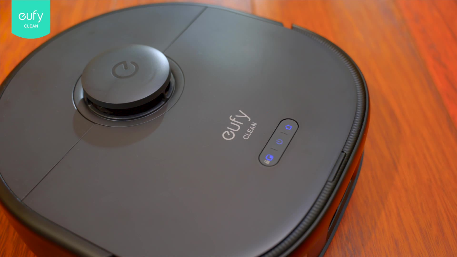 robotic vacuum black wood floor