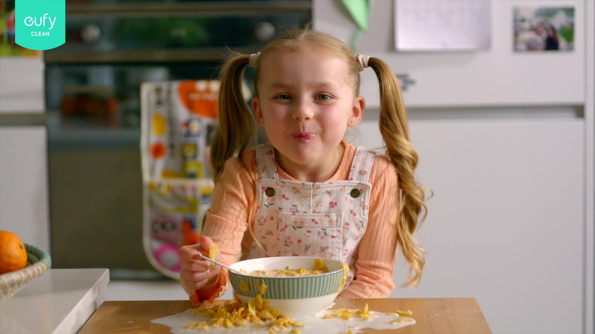 child mess eating cereal