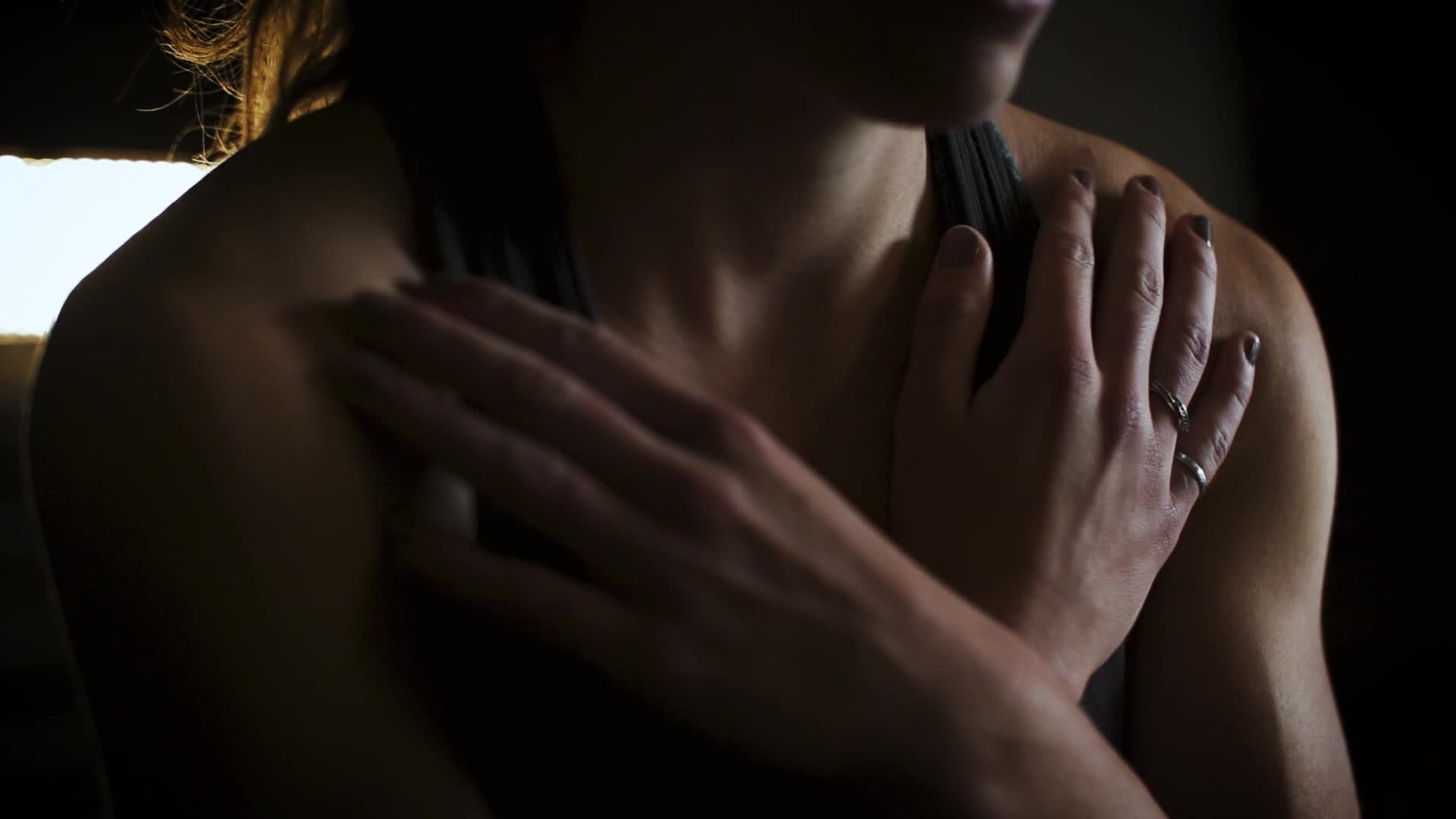 woman close-up sit-up chest hands