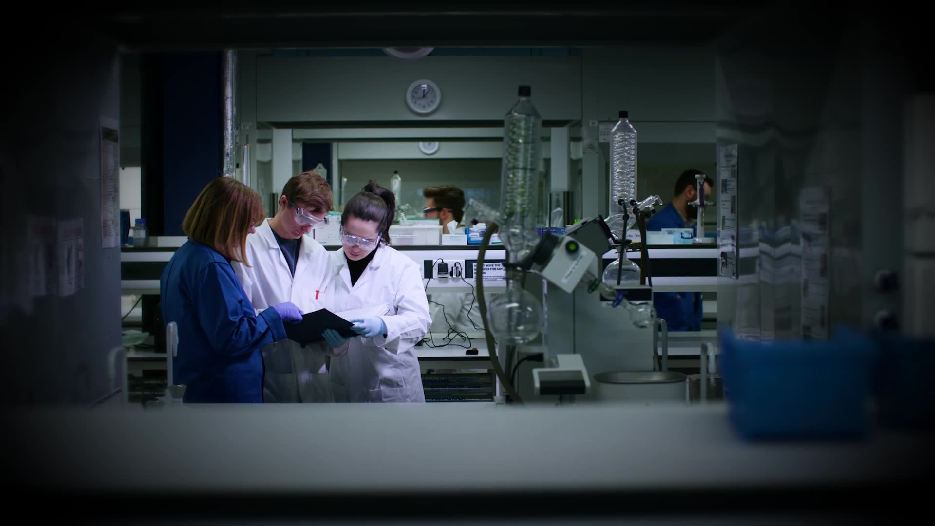man woman science lab coats