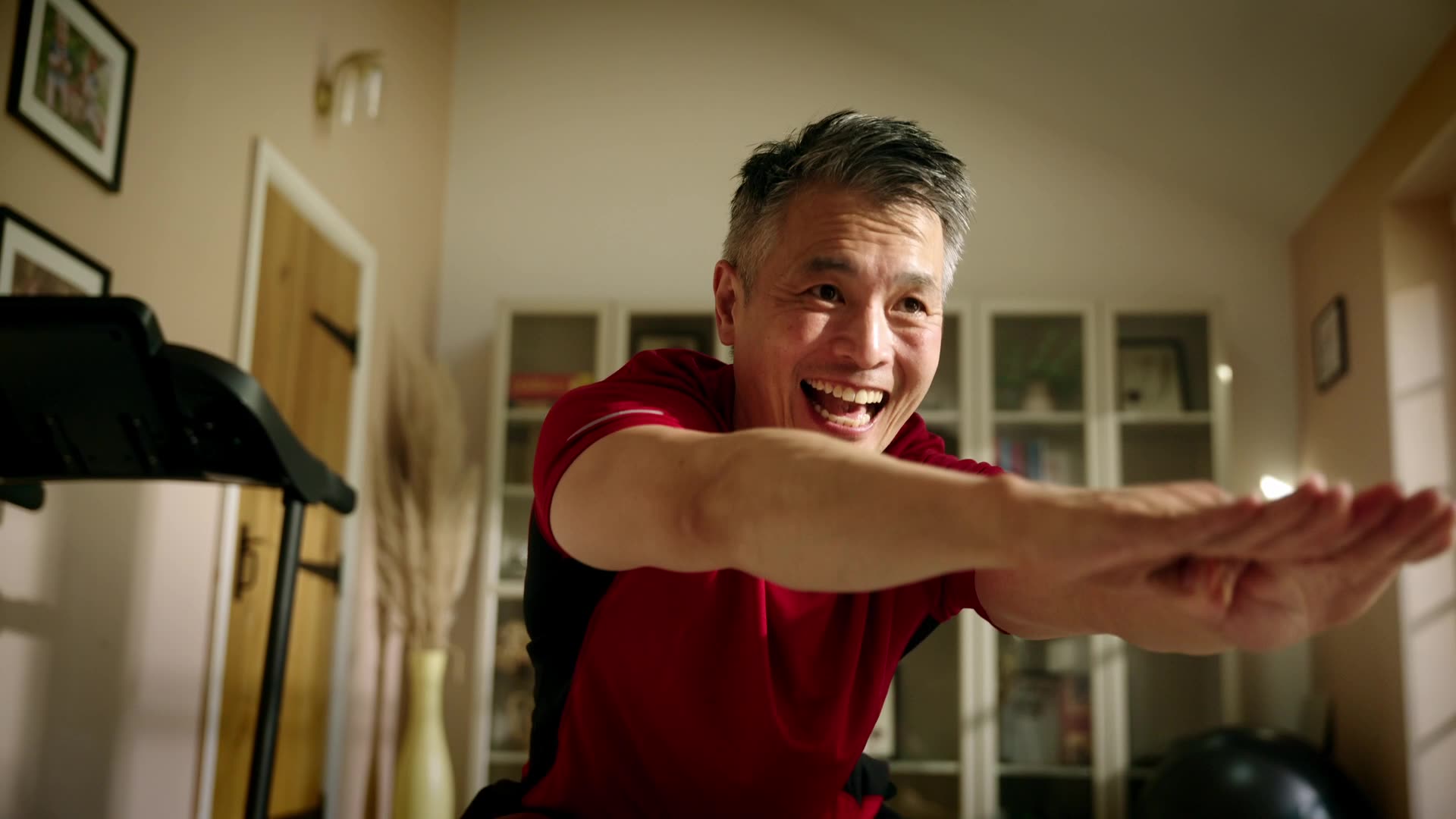 man happy exercise sunny home