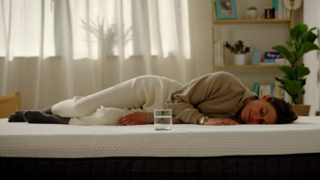 woman mattress glass water