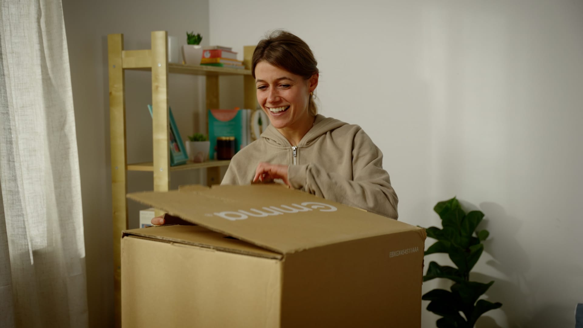 woman happy box emma mattress